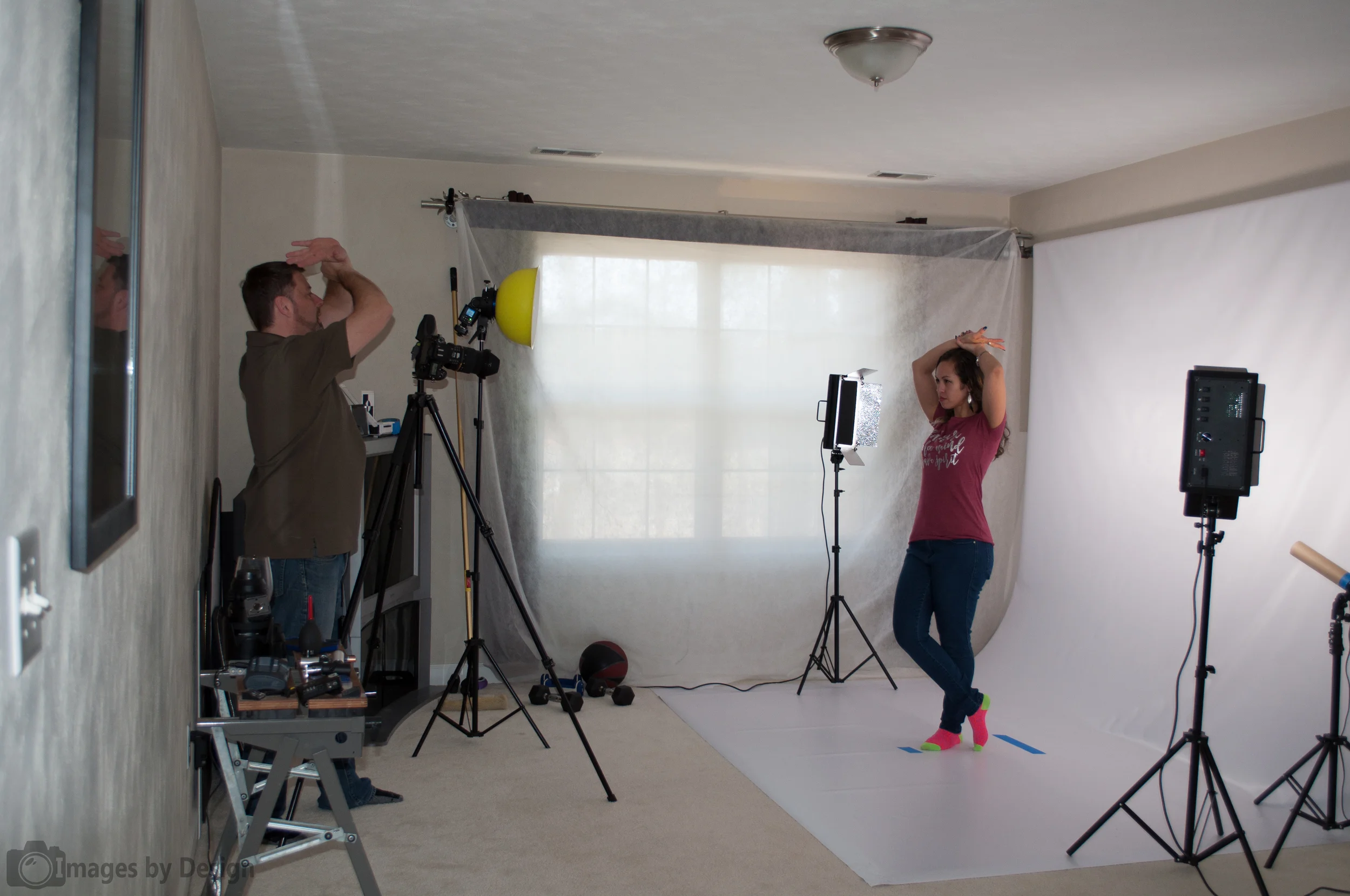 I recently created this home studio so I can constantly practice. Here I'm directing a model during a catalog shoot for a local T-Shirt company. 