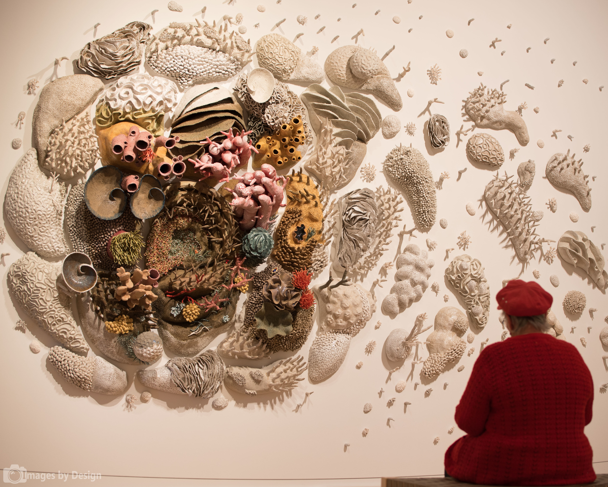 Slow Art Day participant, Pat, enjoying "Our Changing Seas III" by Courtney Mattison
