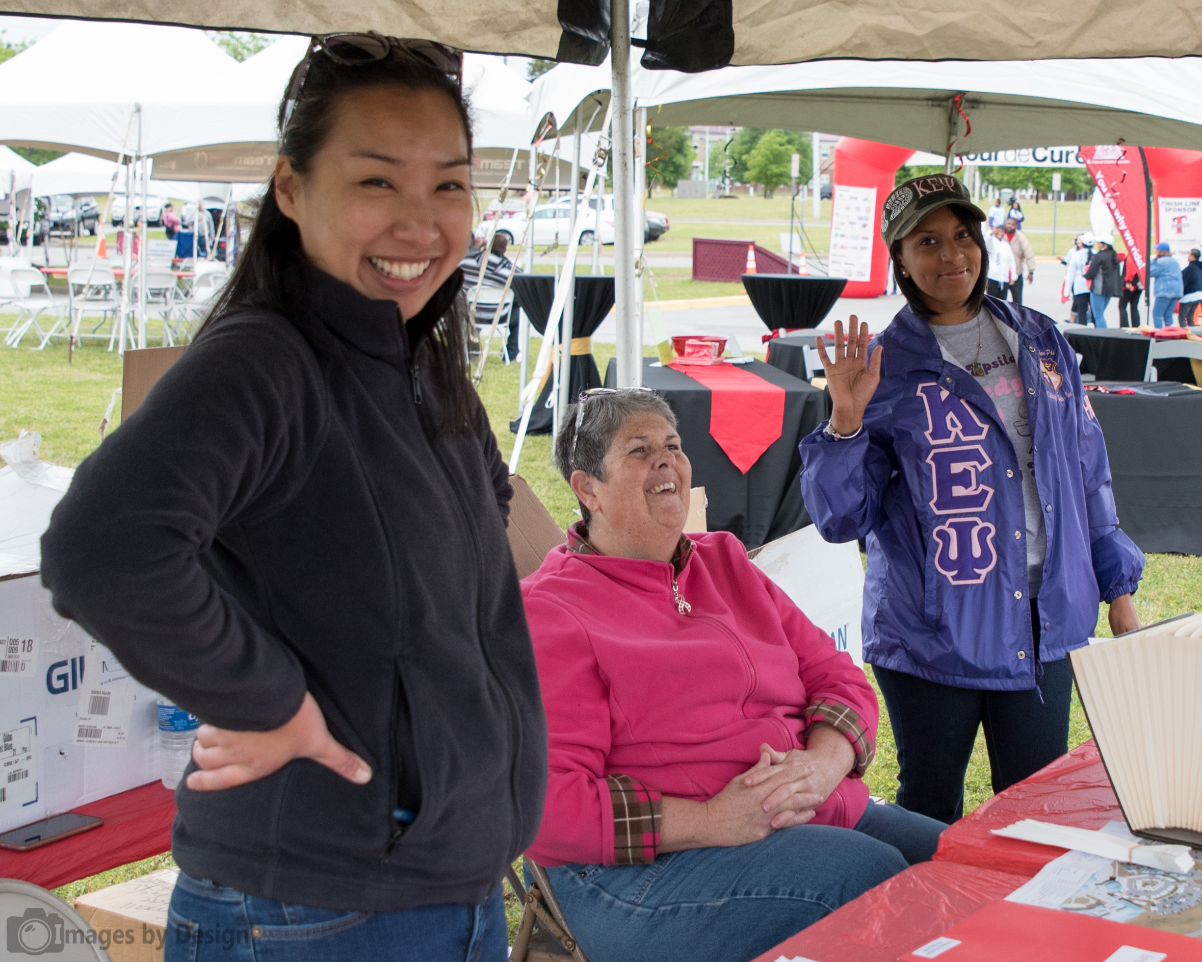 Volunteers working the registration table - Tour du Cure Hampton Roads 2016 