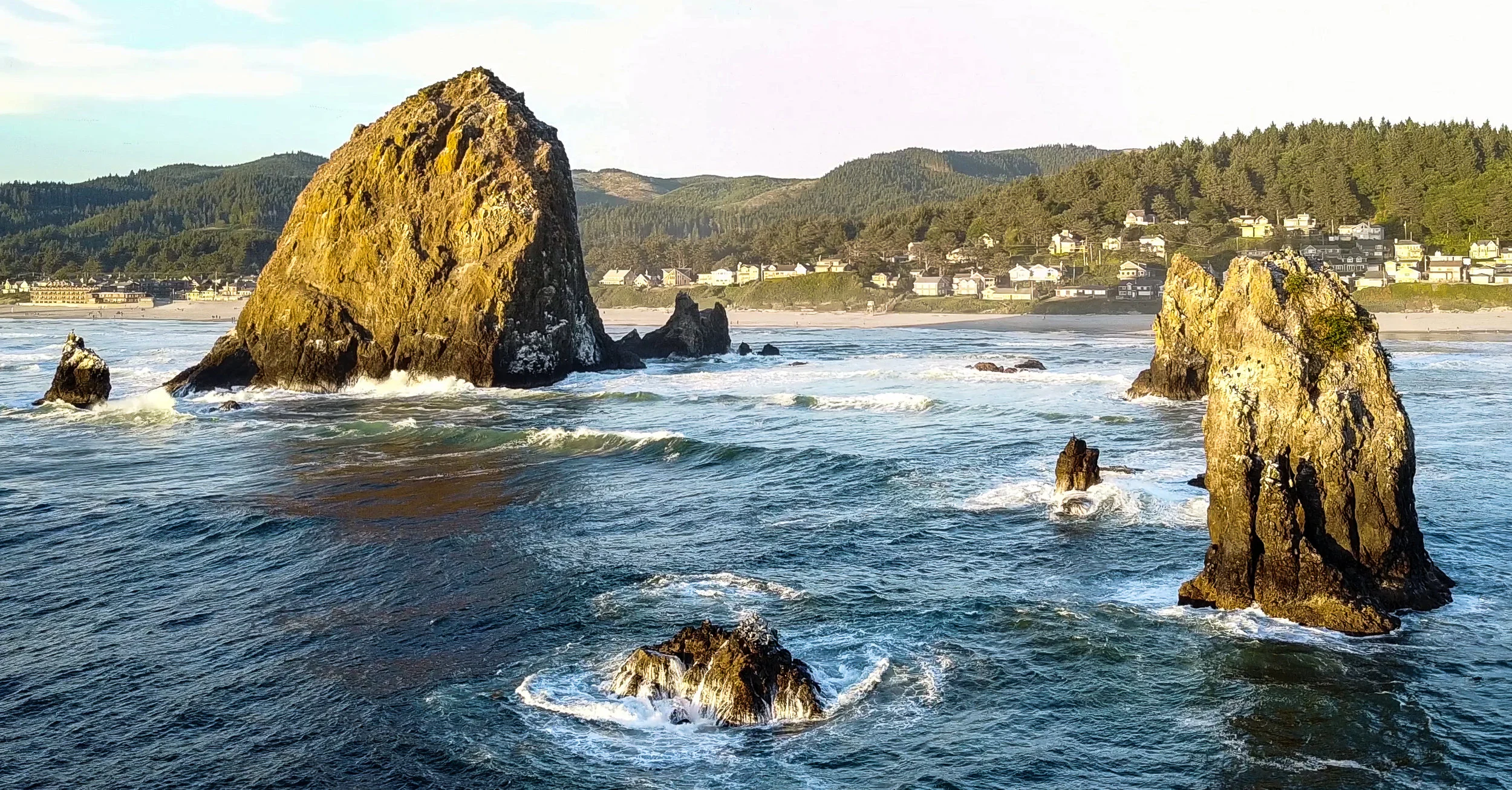 Cannon Beach , Oregon. Haystack rock as seen from the ocean side. ©2017 Images by Design