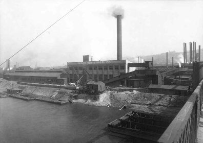 Exterior of Oliver Iron and Steel Works as seen from 10th Street Bridge. (1913) 
