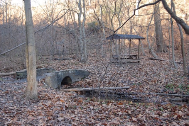 Stone footbridge over stream alongside Tranquil Trail