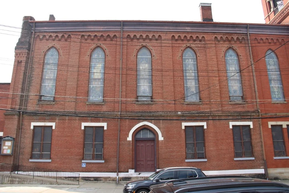 12 View west showing east (side) façade.jpg