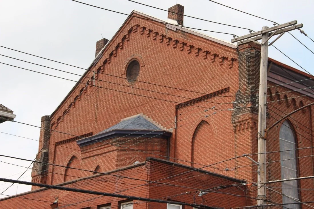 14 View northwest showing detail of rear (south) façade of church.jpg