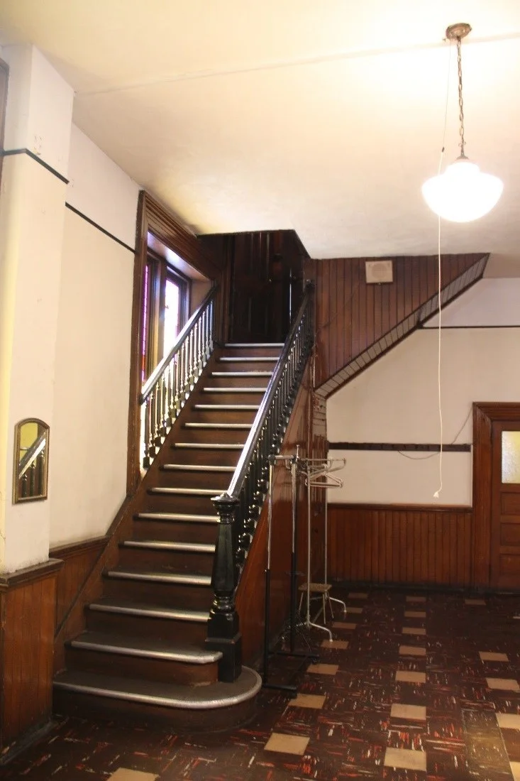 28 View south showing stairs (original to 1869) leading from Sunday school room to the rear of the sanctuary on the second floor.jpg