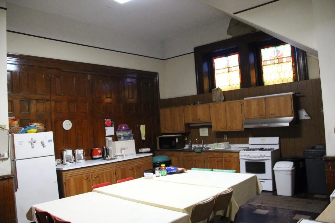 34 View southwest showing 1st floor west anteroom, now used as a kitchen.jpg