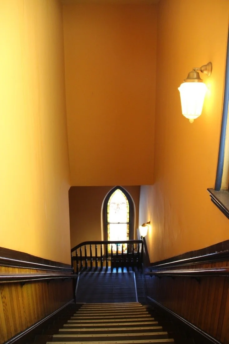 43 View north showing view looking down east stairs toward narthex on 1st floor..jpg