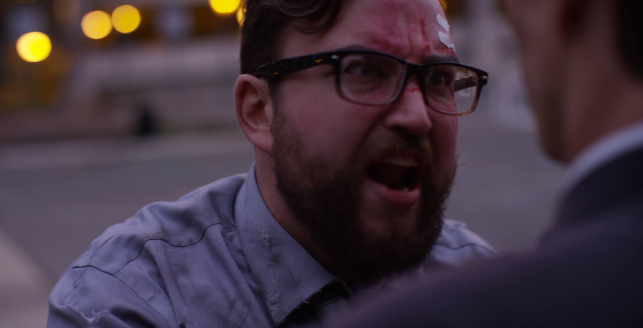 Raw still from "The Shift." Kevin (Greg Tharpe) lets Satan (Travis Cluff) have it.