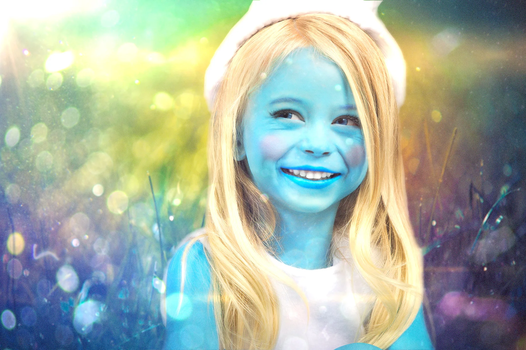 “Smurfette” - Cosplay Model: Vela Cluff | Photography by: Cody Allred | Makeup/Hair by: Amber Medina | Wardrobe by: Trina Short | Design by: Tremendum Pictures