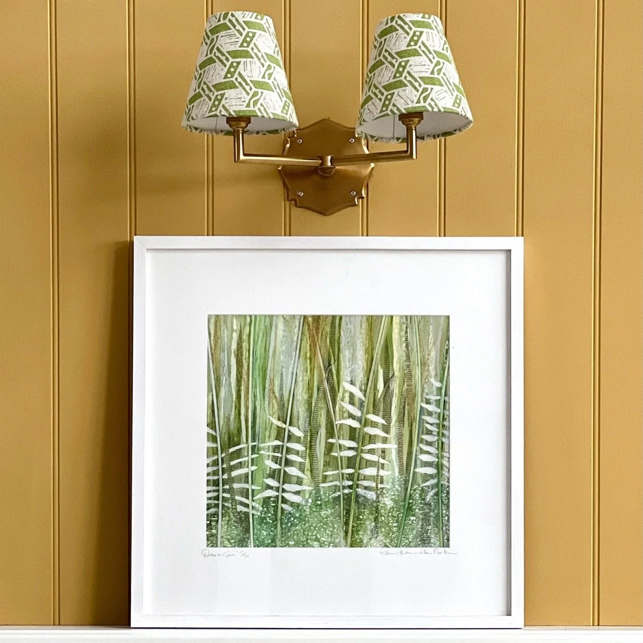 Colour and light!  Combine ochre walls with fresh green lampshades for a summery, happy scheme. 

Lampshades made in Malla Apple printed linen. 

Light fitting @pookylights 
Artwork @creativerecycling_hand_crafted 

#zoeglencrossfabrics 
#greenlinen