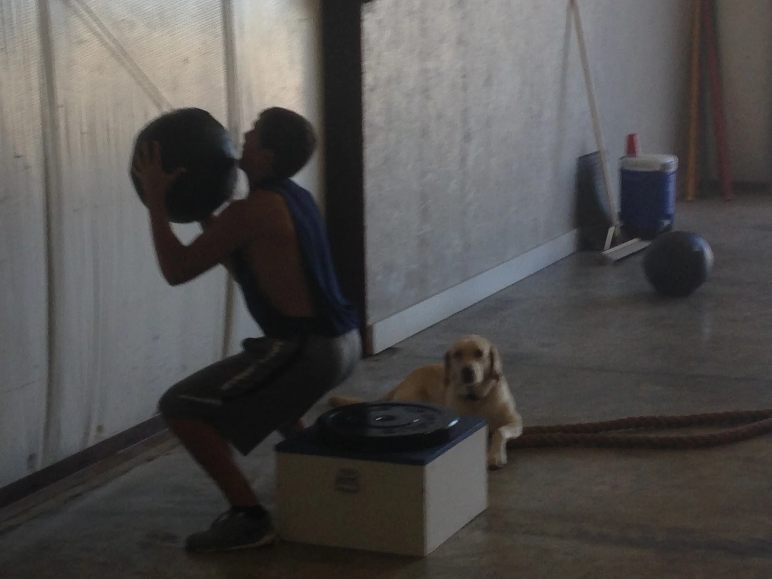 Topanga making sure Andrew gets to depth on his wall balls.