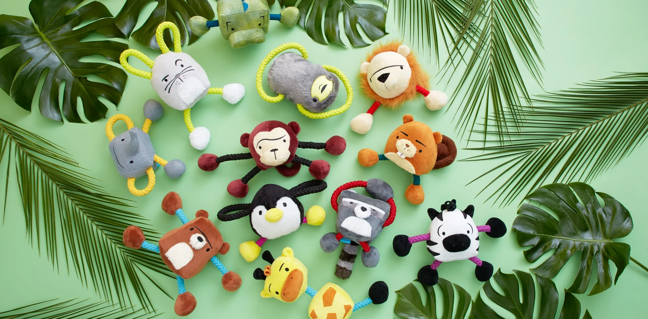 A collection of dog plush tug toys designed with sophisticated animal character styling and humorous facial expressions