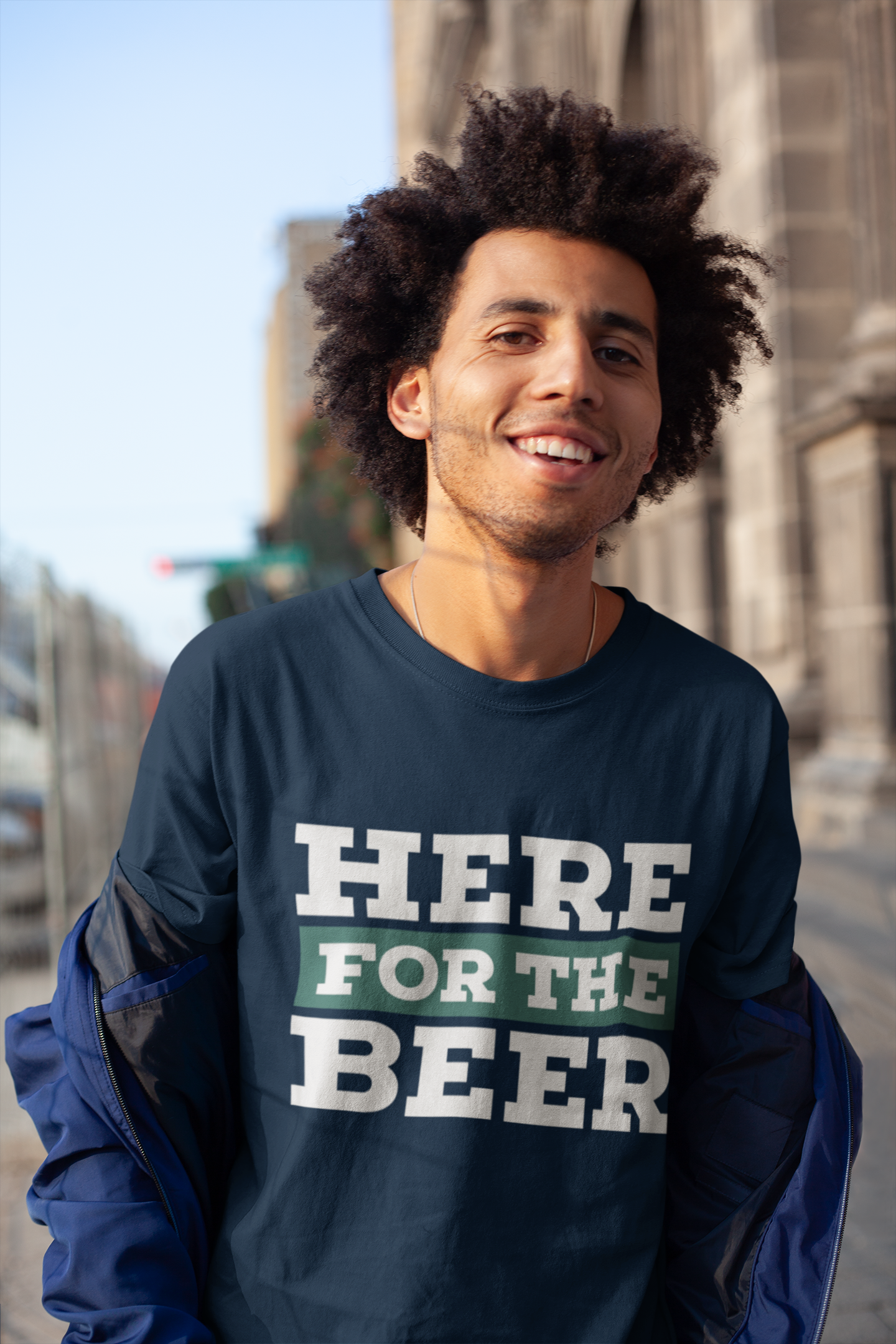 tee-mockup-of-a-happy-man-with-an-afro-out-on-the-street-18071.png
