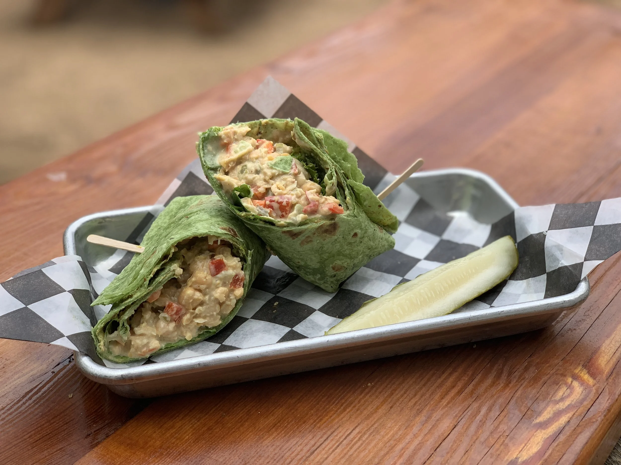 The Hippy Hollow - Vegan chickpea sandwich on a spinach wrap