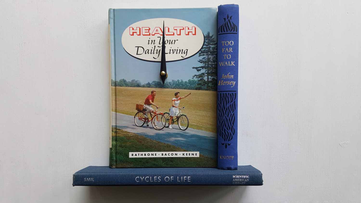 Cycles of Life Book Clock