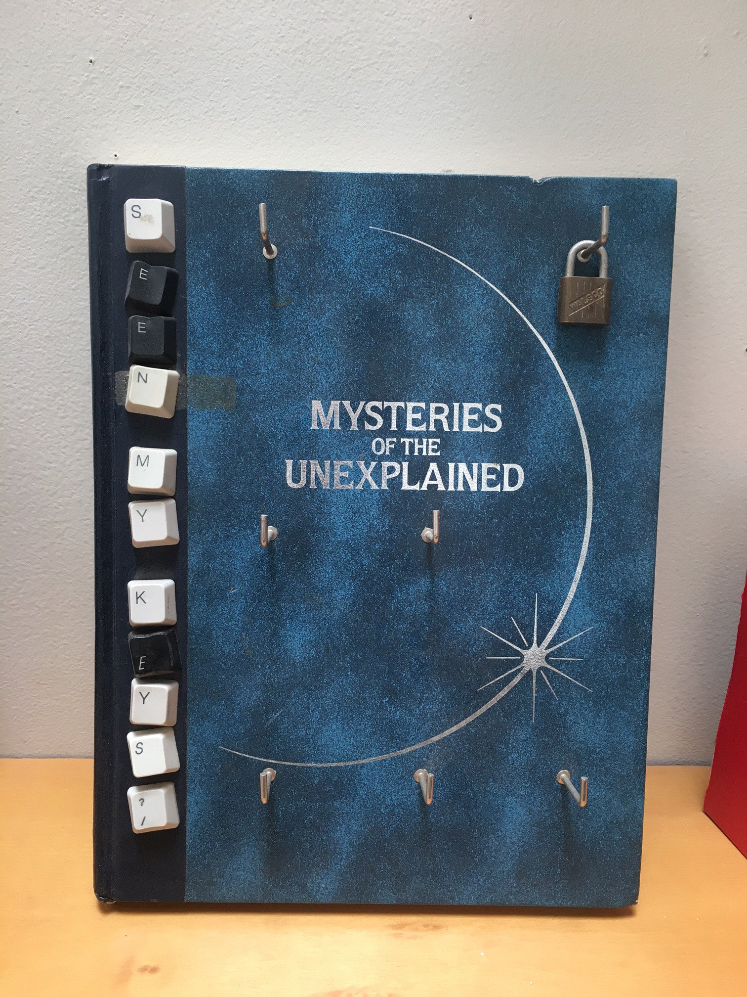 Mysteries Key Holder by Jim Rosenau