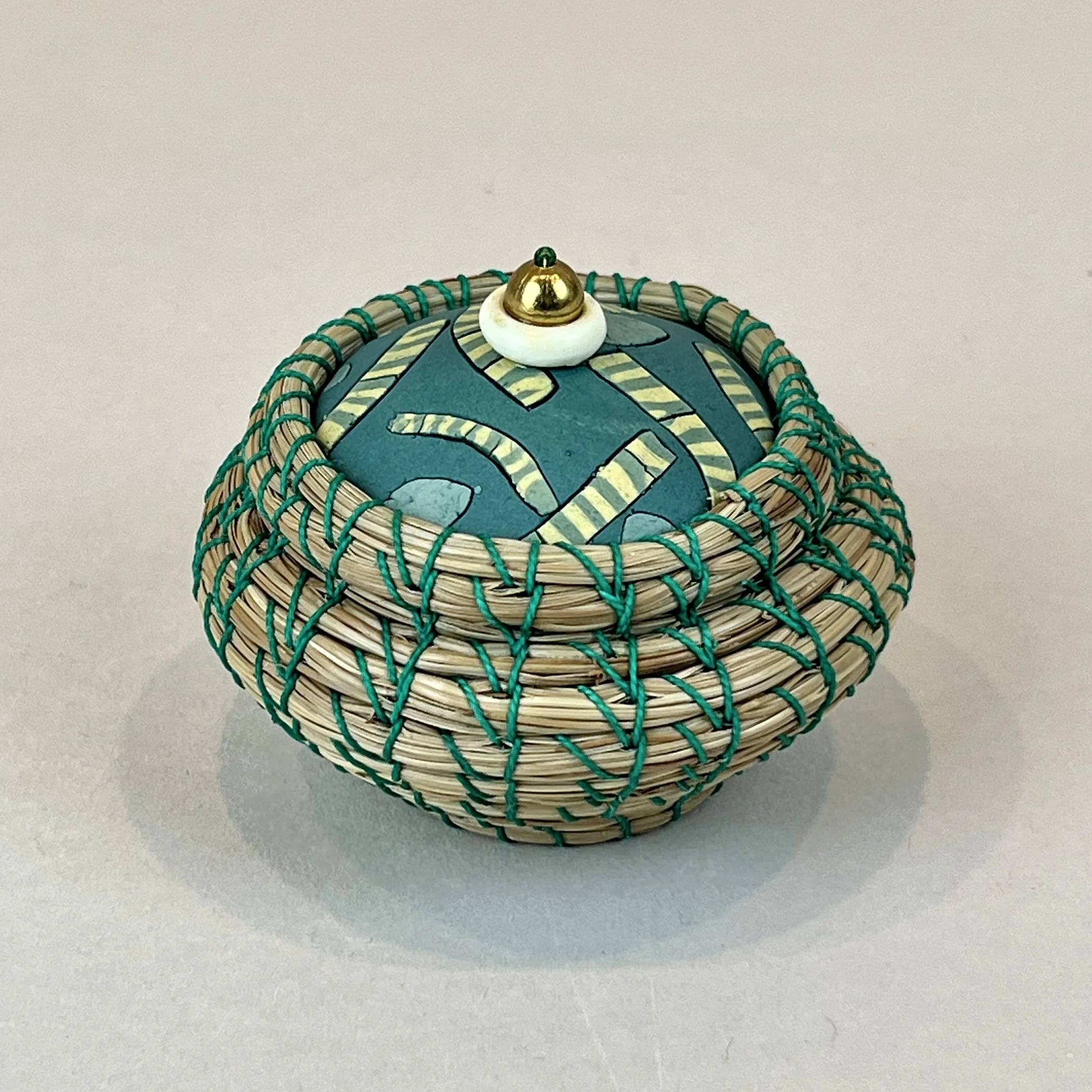 MWoodburn-TreasureKeeper-Blue-side.jpg