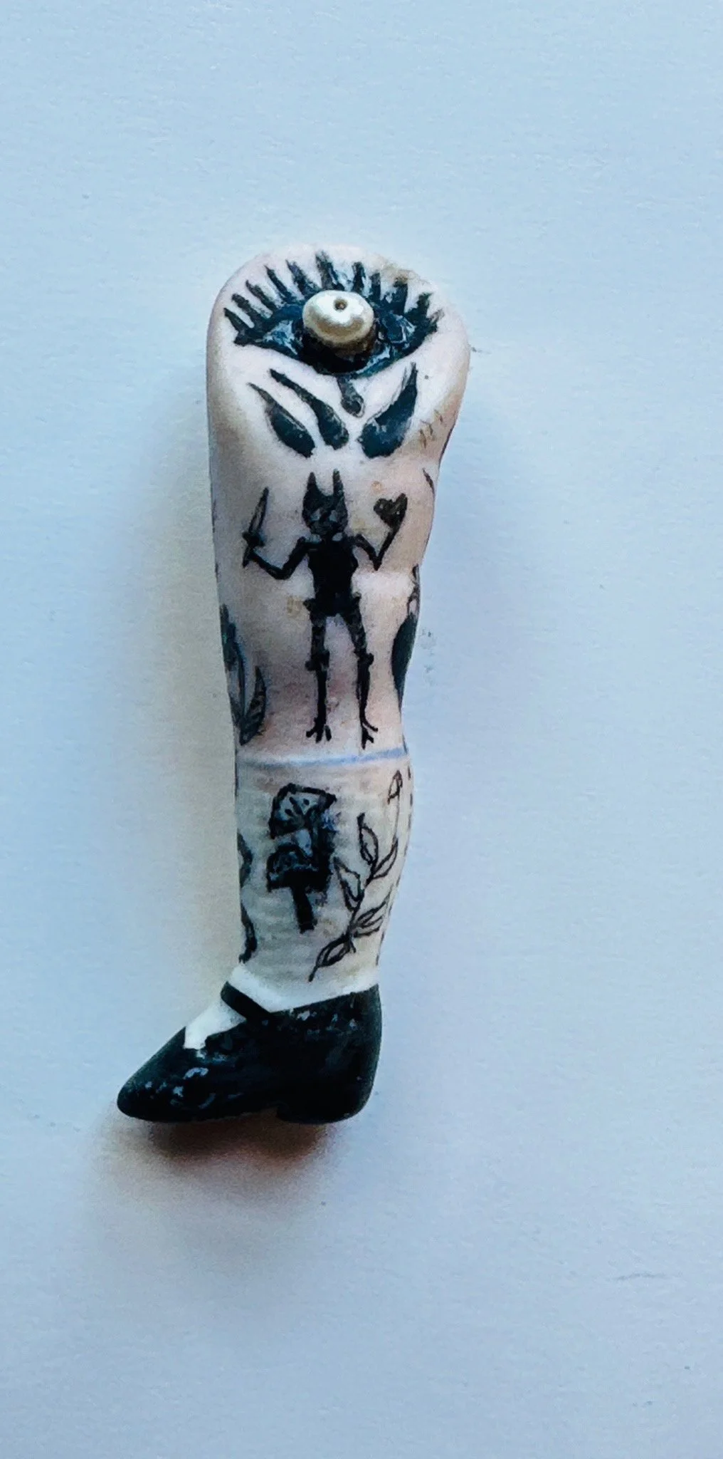 PTraverso-TattooLegBunnyandEye-front-back.jpg