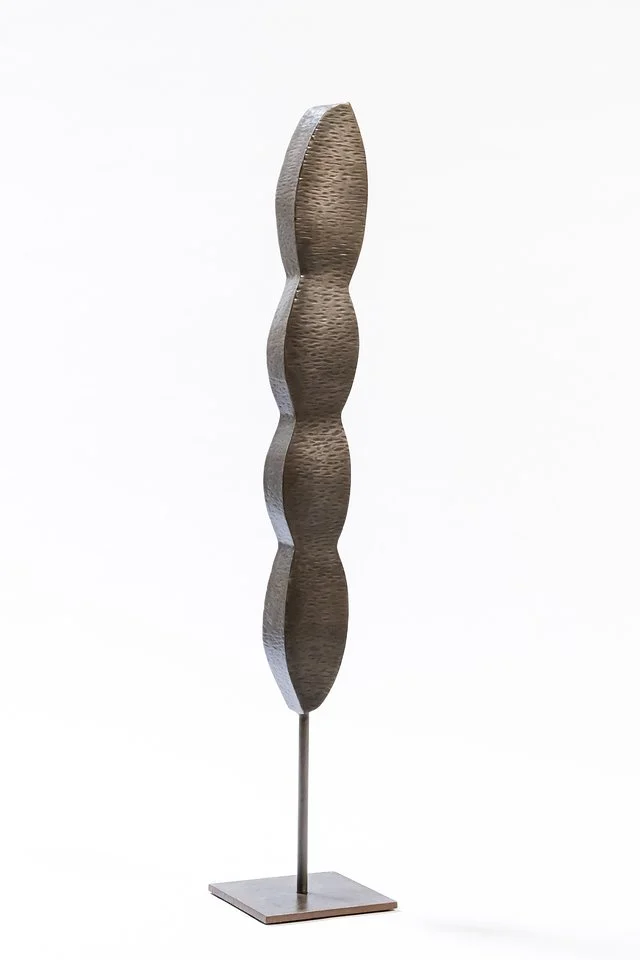 Bean Totem by Sebastian Roldan