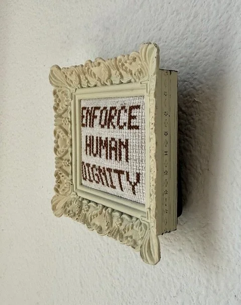 JBalisle_ENFORCE HUMAN DIGNITY sideview.jpeg