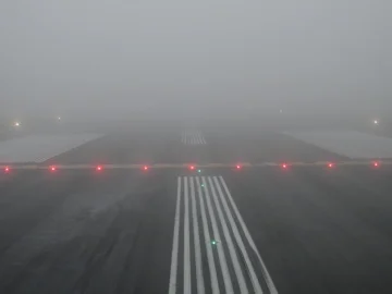 Holding short in fog prone YYT. Guess where the forward scatter RVR sensor was tested to ensure its reliability?
