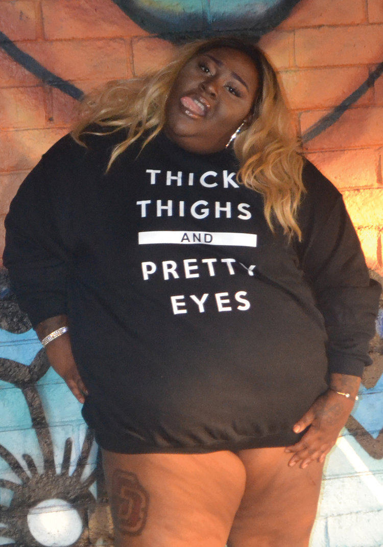 thickthighsprettyeyessweater.jpg