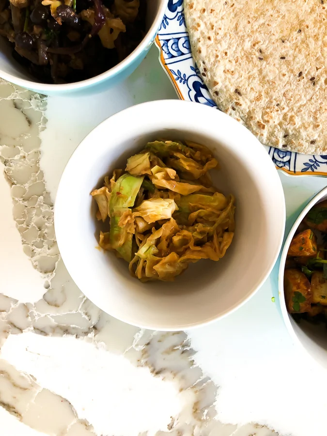 Fresh green cabbage laced with creamy peanut sauce - a little bowl of heaven.