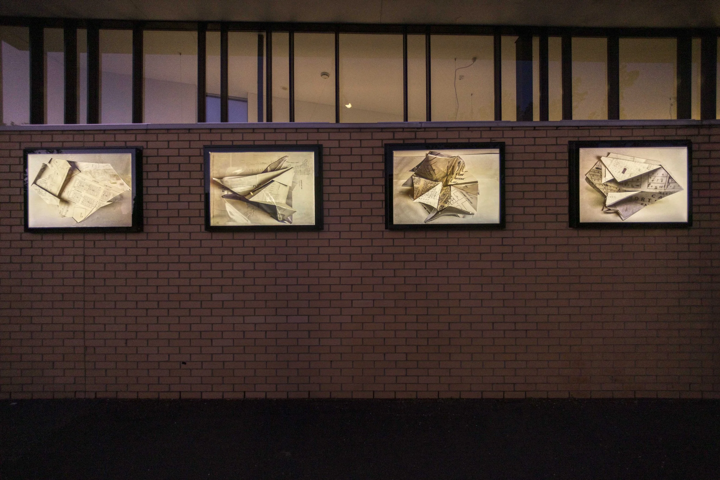  Quotient Set’ is a set of photographs of four collages constructed from the folding of 19th century maps of the immediate area surrounding the Library. These maps represent a contested time in our colonial past when Indigenous land was parcelled off