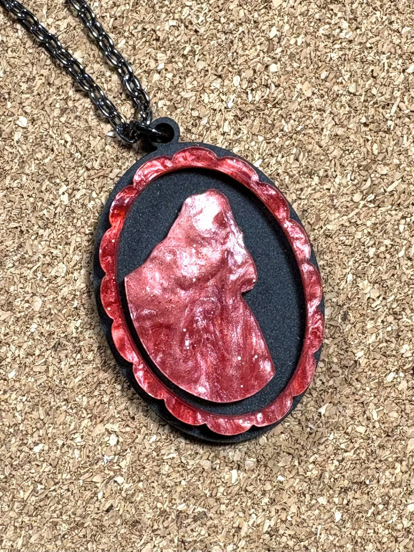 Cameo Squatch Pendant Pink on Black close up.jpg