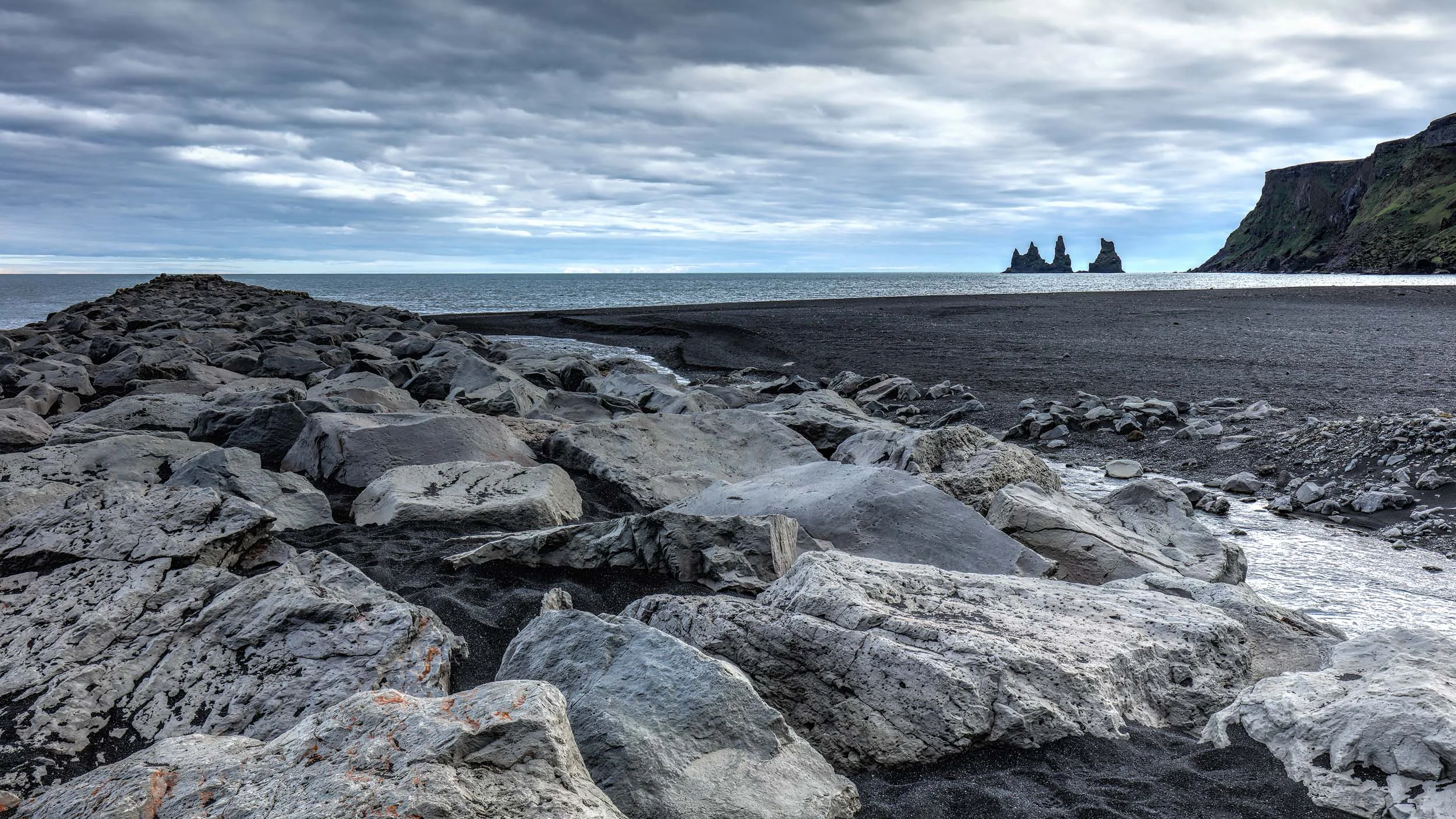 Reynisdrangar view with the black sand beach