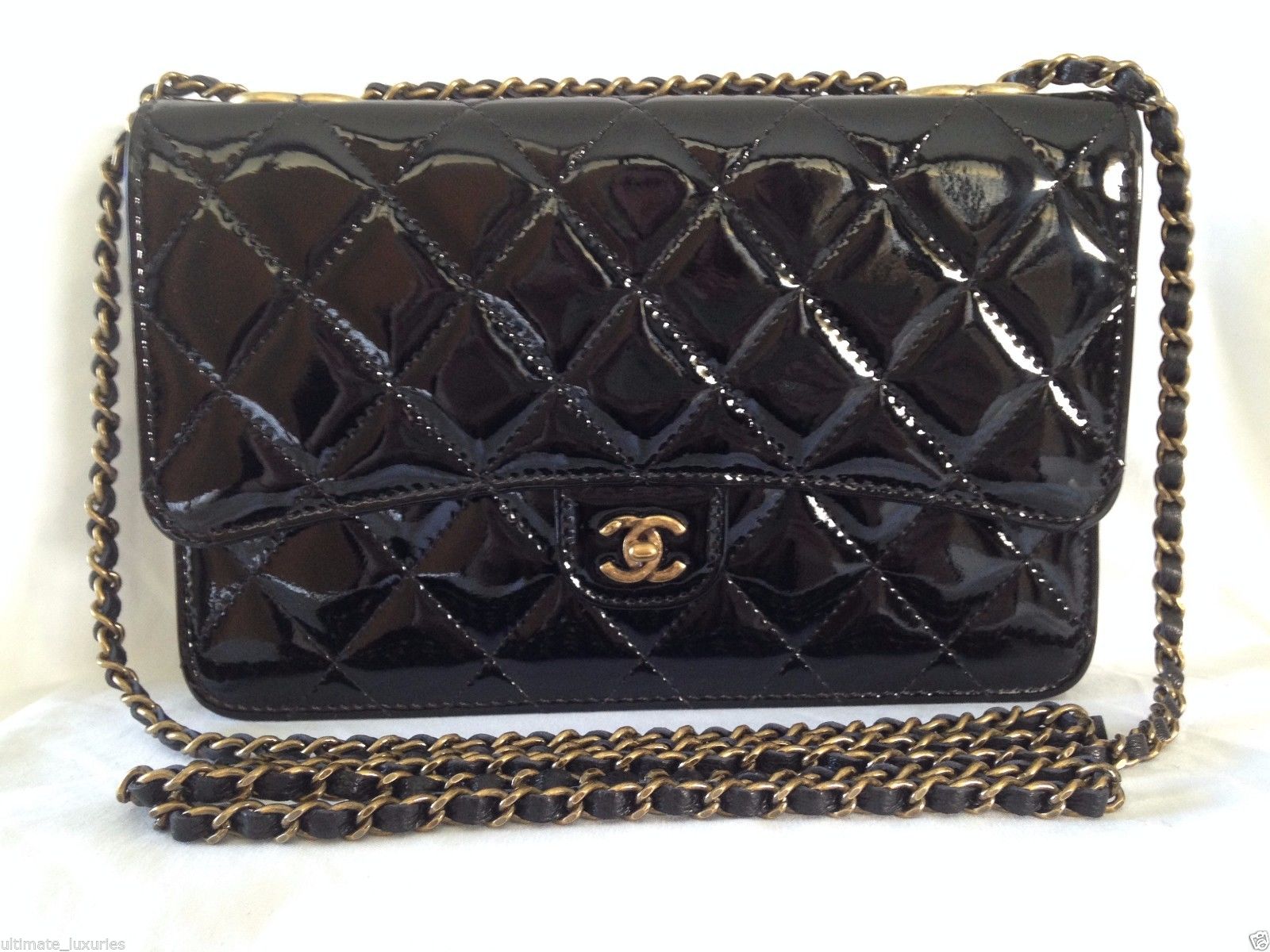 Chanel Black Patent Leather WOC. Price withheld to spare my husband a heart attack.