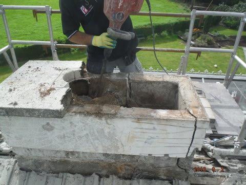 Removing the plaster and capping revealed a serious fault; the entire stack was cracked.