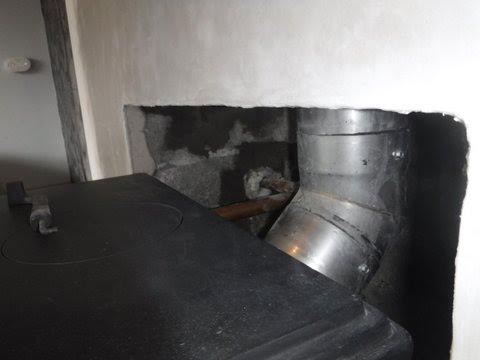 Connecting flue to stove following chimney relining