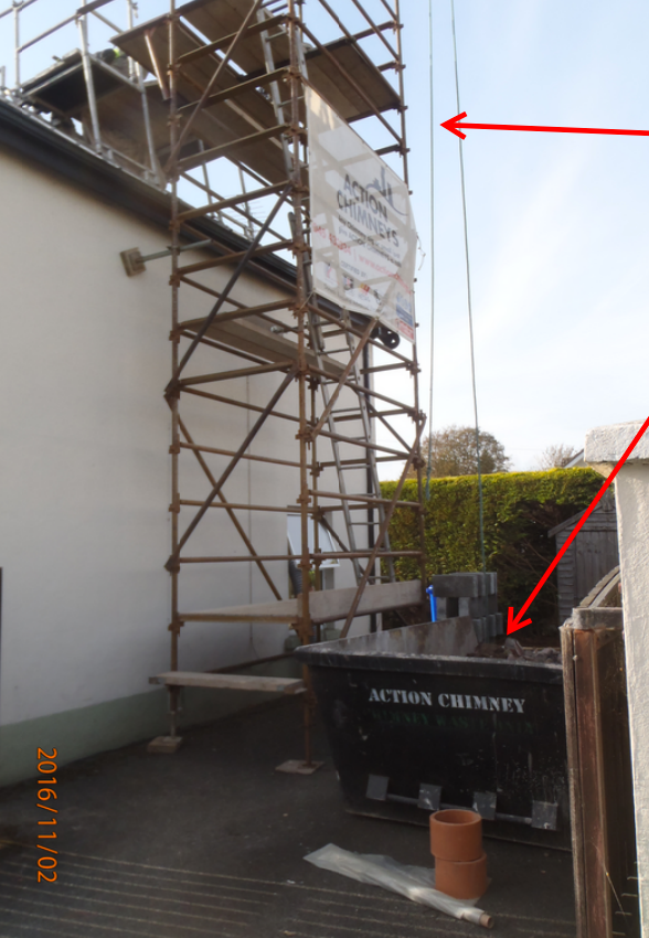Scaffolding and skip on site for certified removal of waste material.
