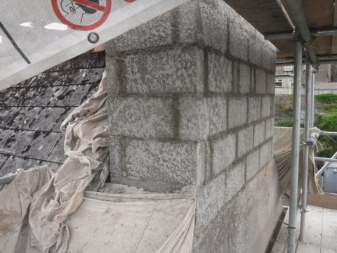 Chimney being flashed.
