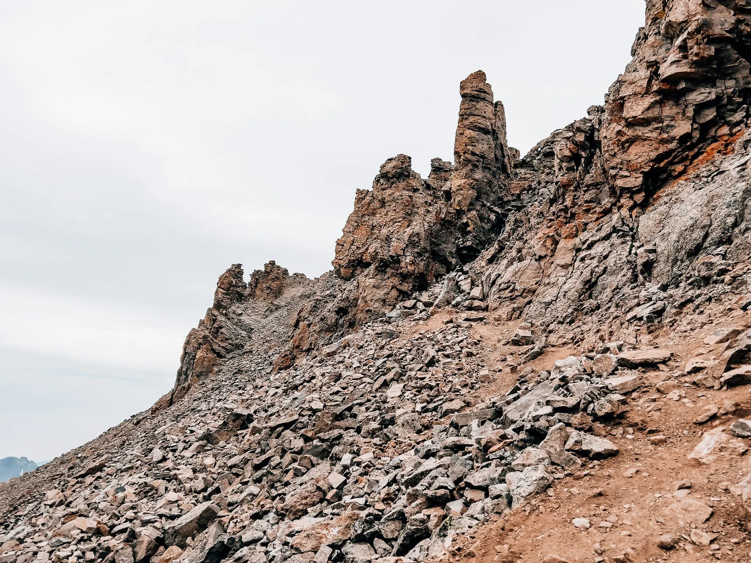Rocky summit spires on the approach to the scramble
