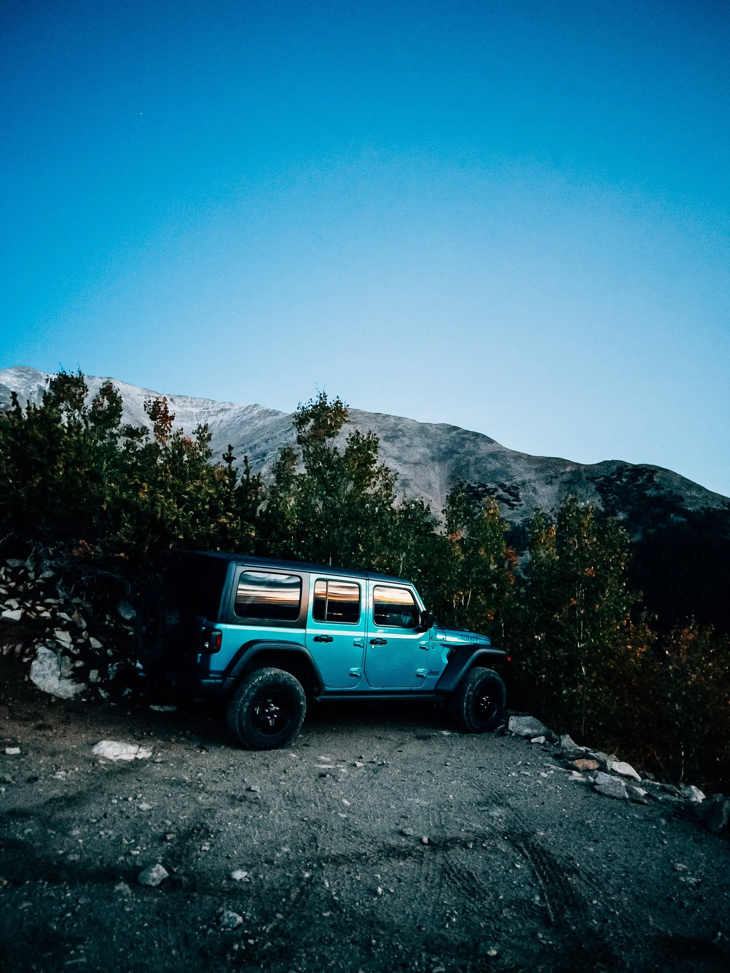 Parked on a switchback above the radio towers at dawn