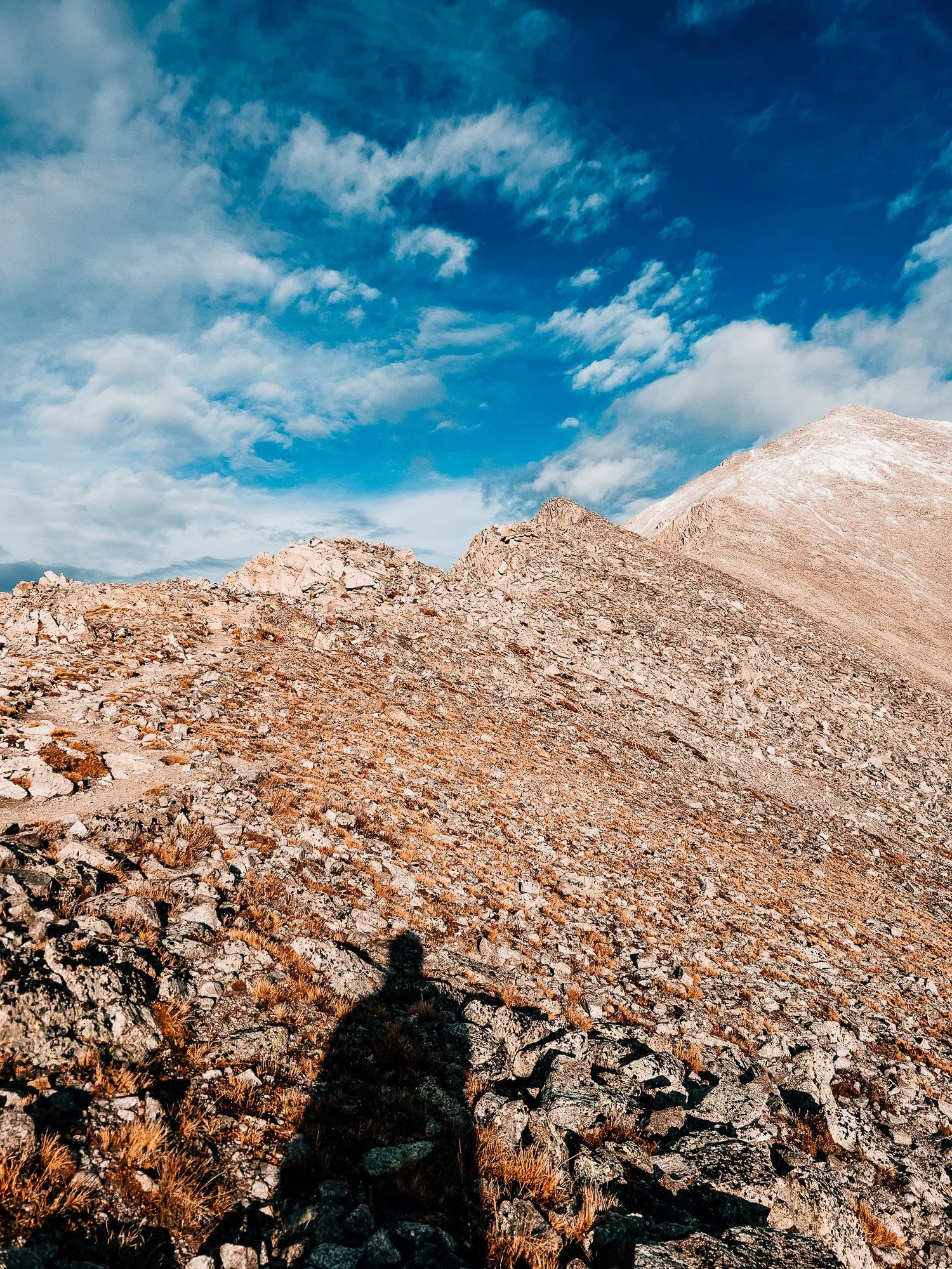 The final ridge with rougher terrain approaching the summit