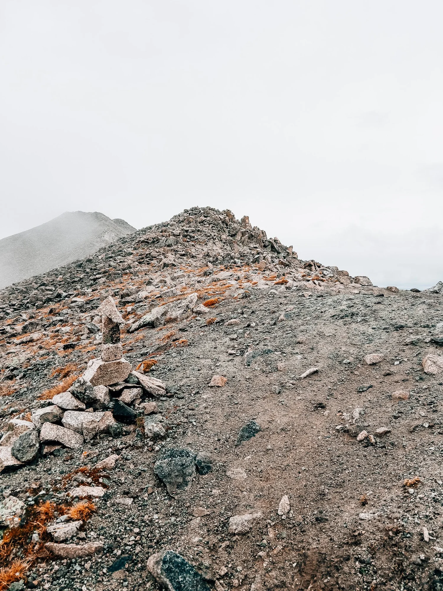 Clouds reducing visibility during descent on Mount Princeton