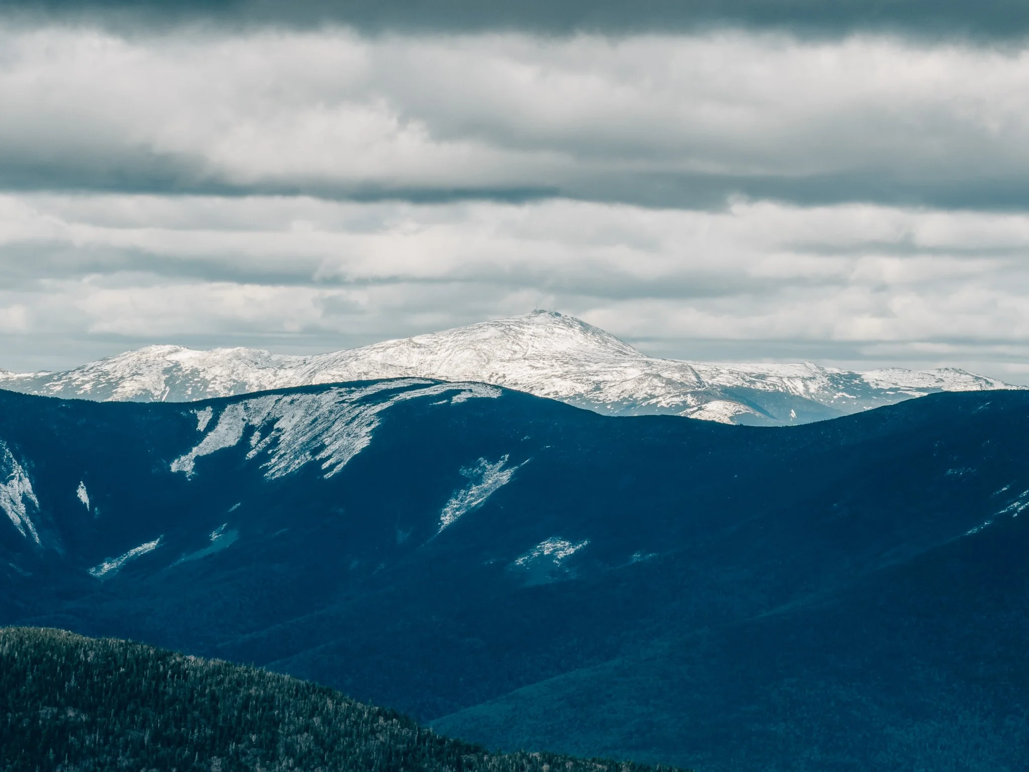 The Presidential Range completely snow-covered to the northeast