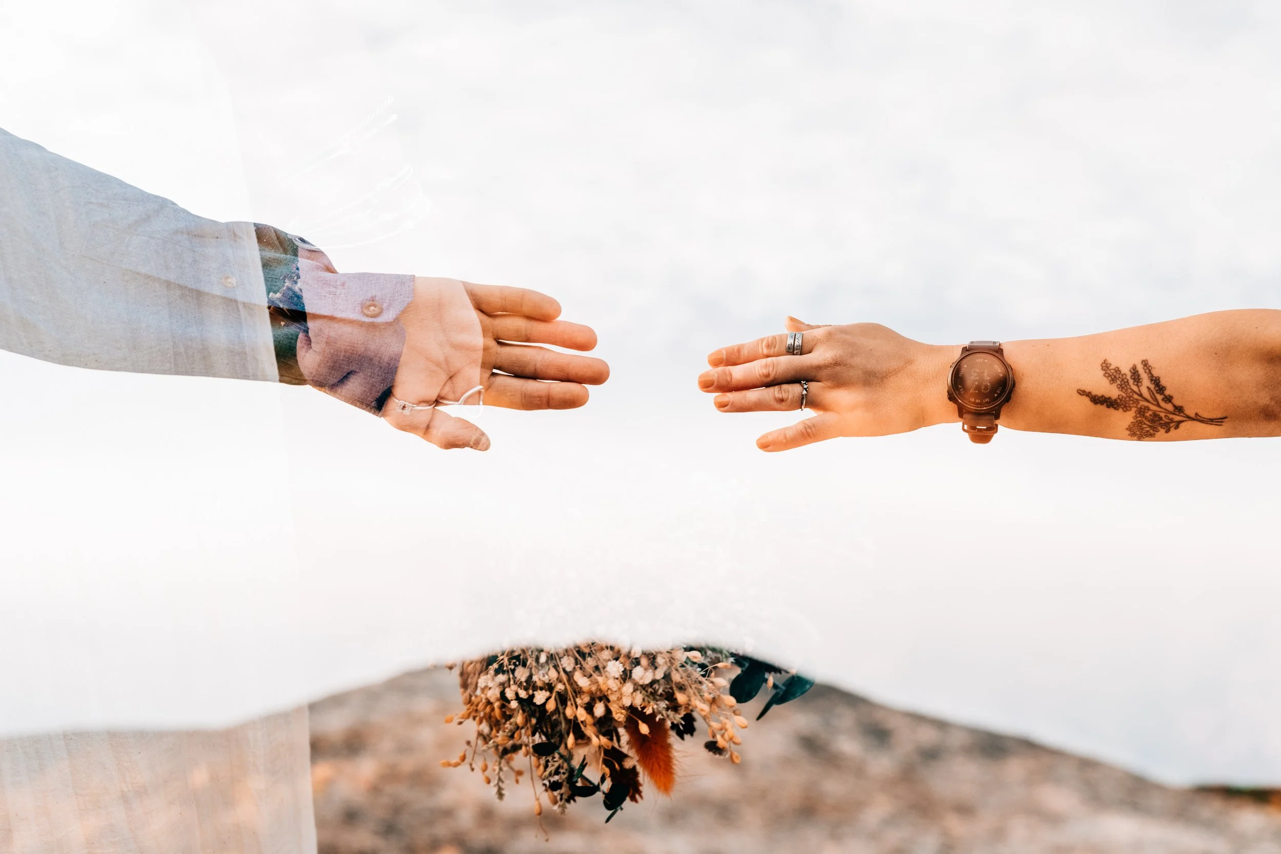 Bride and Groom Hands and Mountains