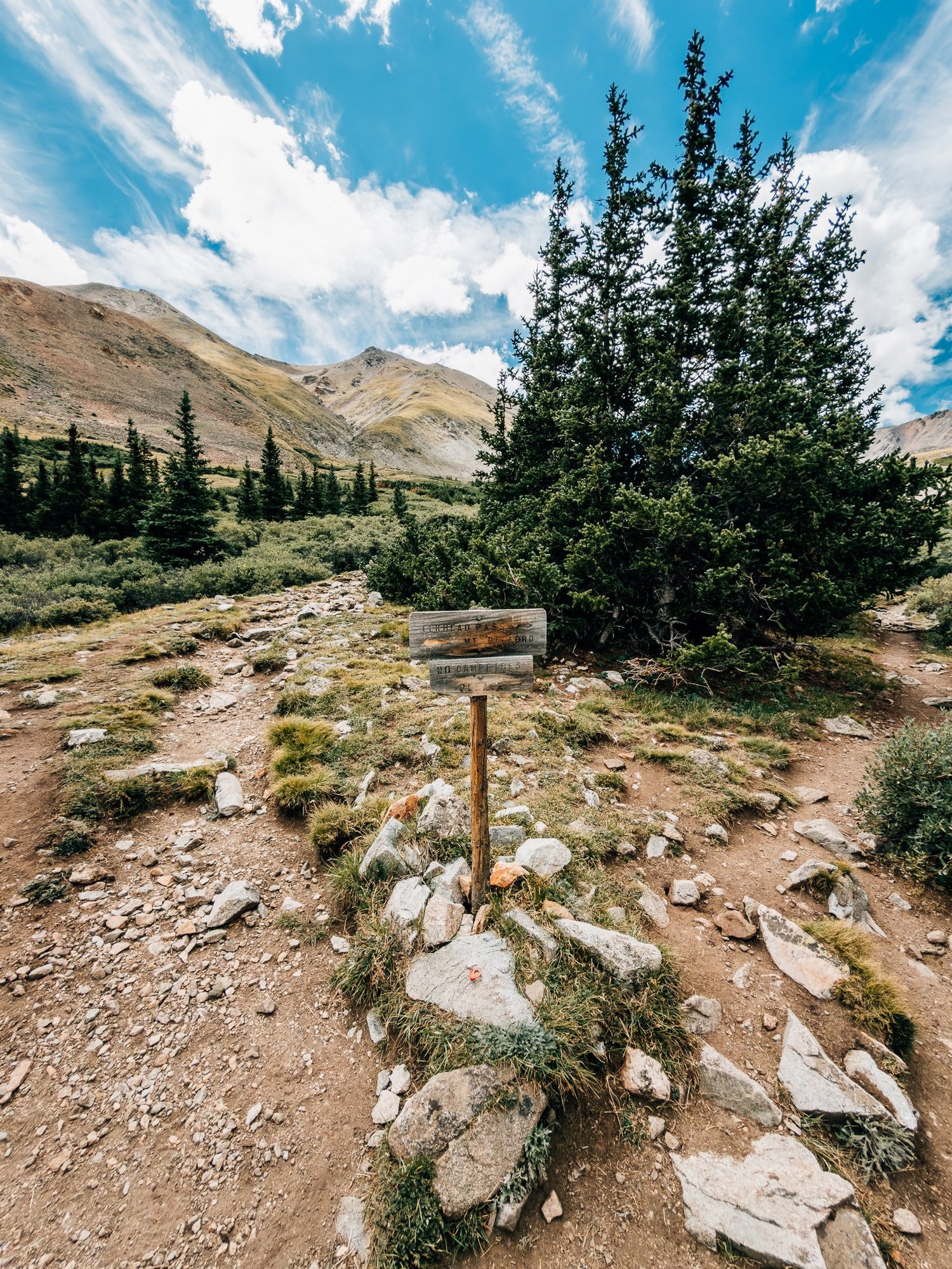 Weathered wooden junction sign where the Mount Belford trail splits from the Missouri Gulch trail