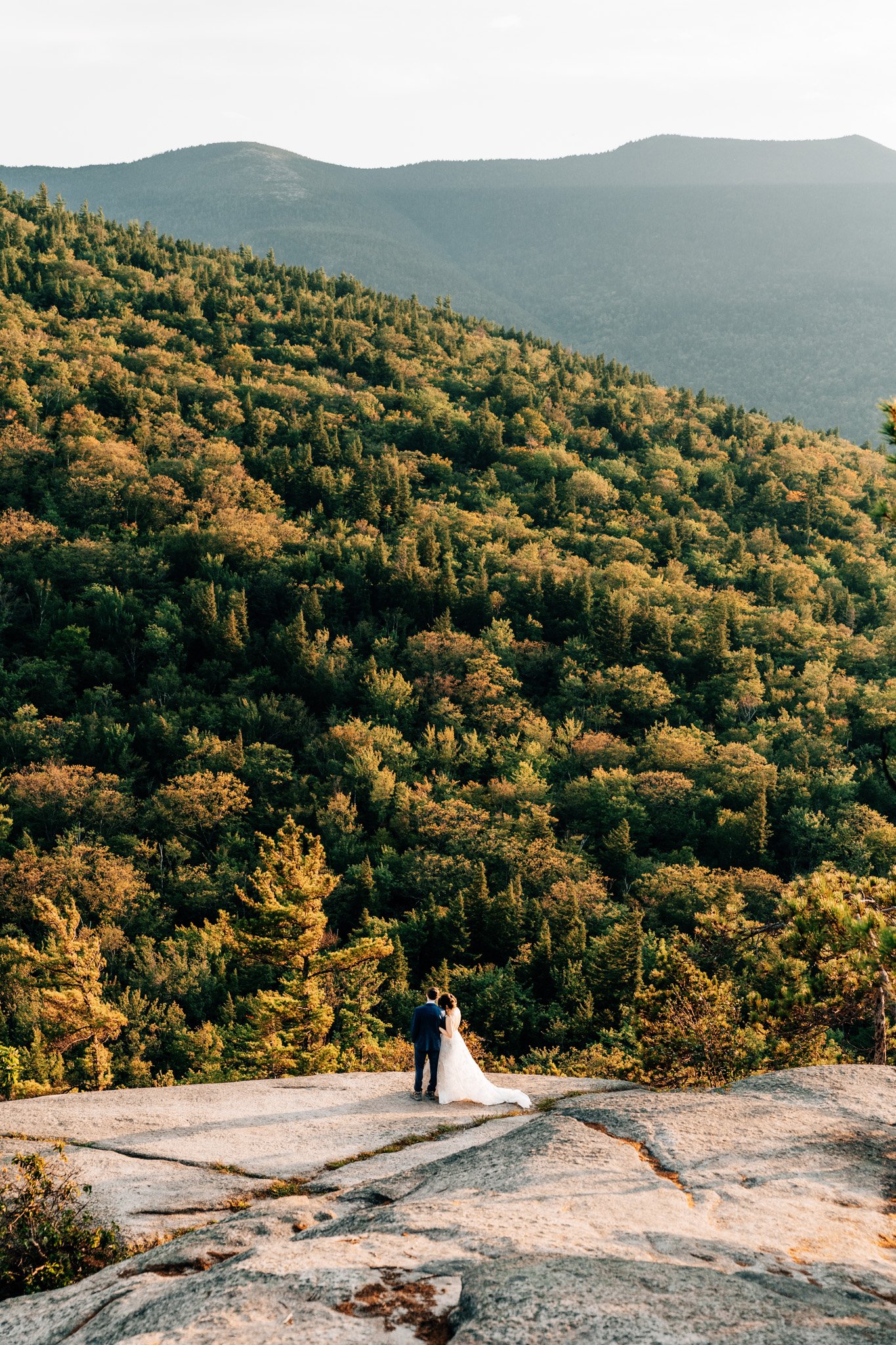 Couple eloping at Cathedral Ledge in late September as the first fall color turns in the White Mountains