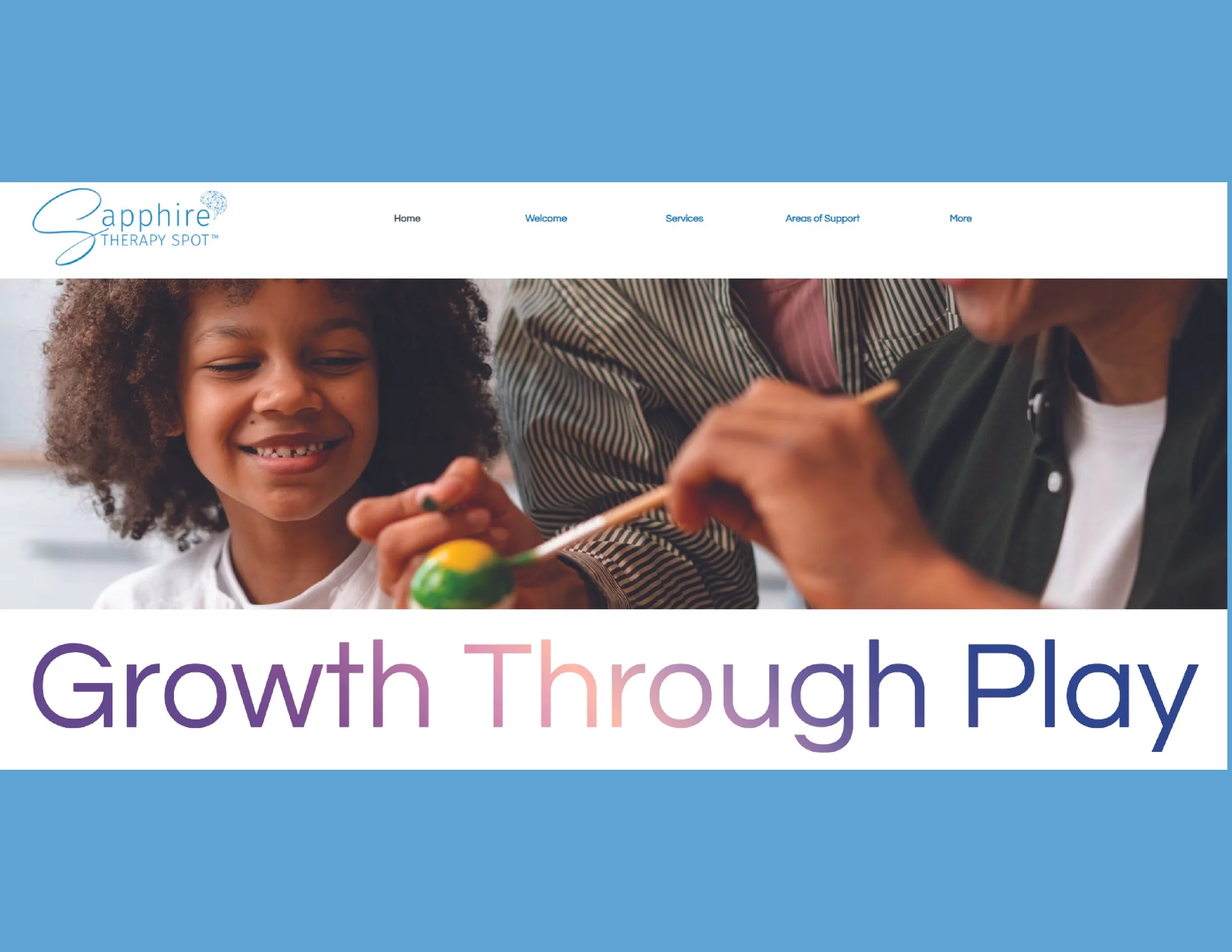 A girl smiling and having her face painted by an adult with paintbrushes, in a setting that appears to be a therapy or activity center.