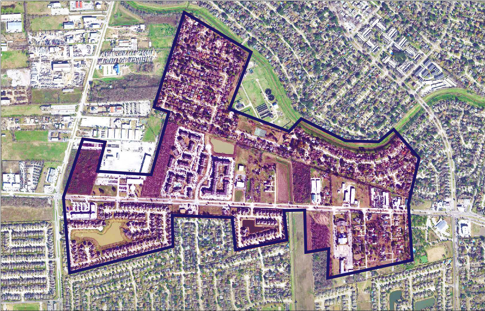Aerial view of a suburban neighborhood with outlined areas, including residential blocks, green spaces, and roads.