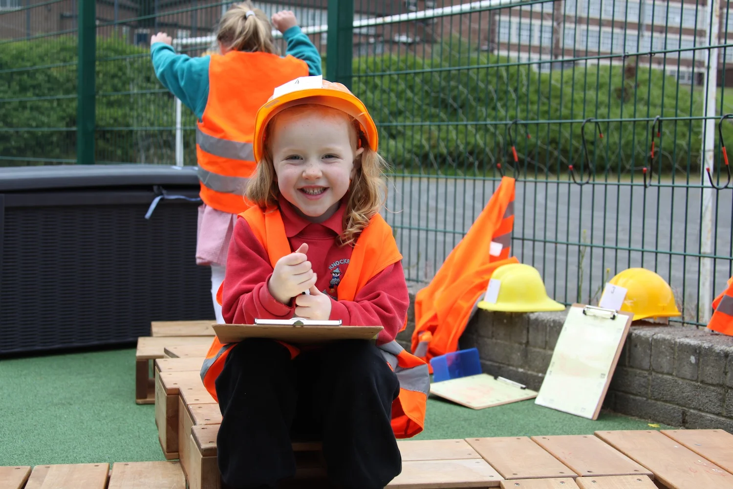 Enjoying free flow play on the side terrace