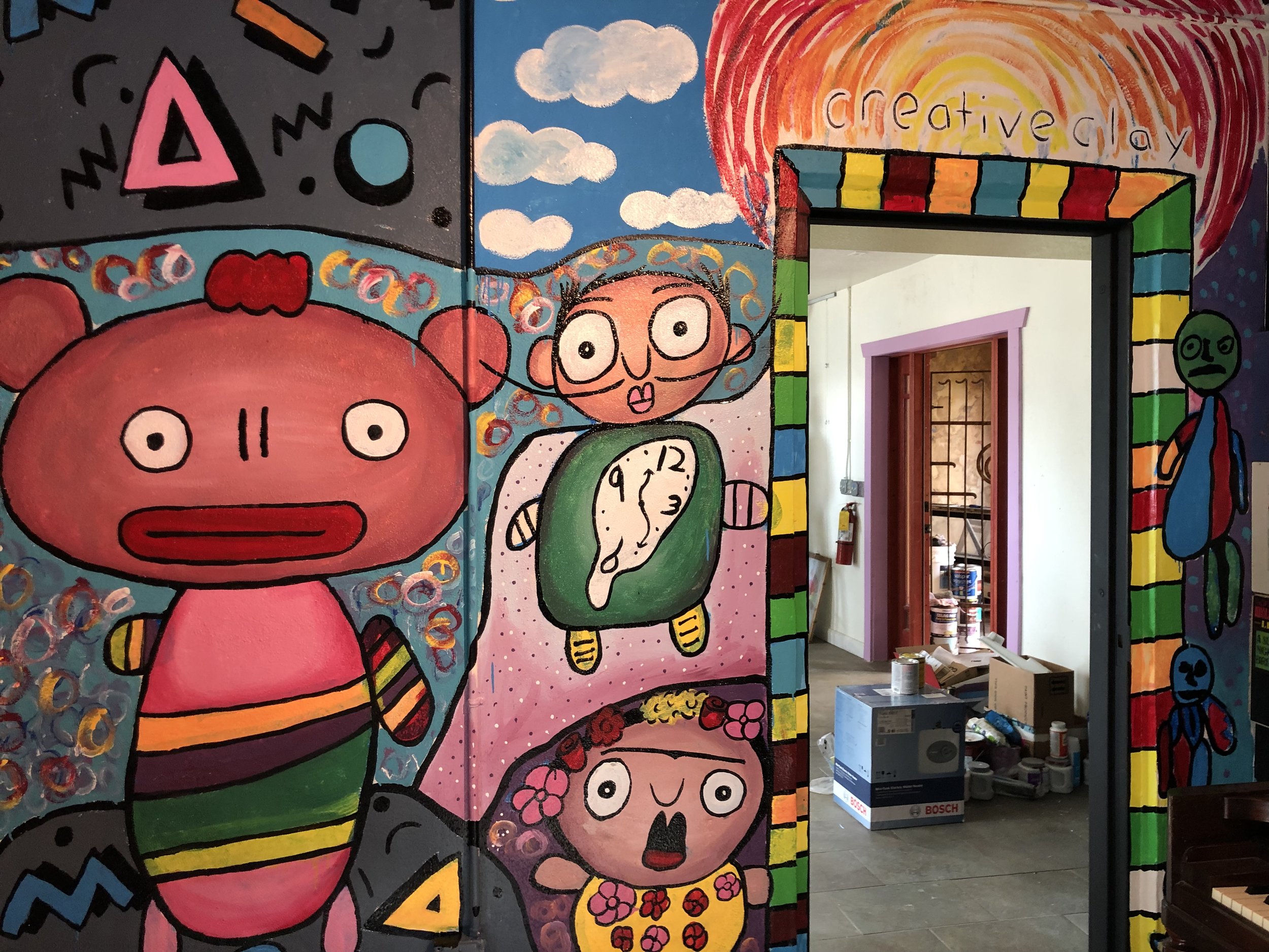 Black Crow’s Grand Central location will feature local art, including these murals that were painted by artists from Creative Clay.