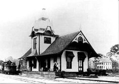 Orange Station is a reference to the Orange Belt Railway, which brought the first train to St. Petersburg in 1888. Shown here is a photo of the first train station.