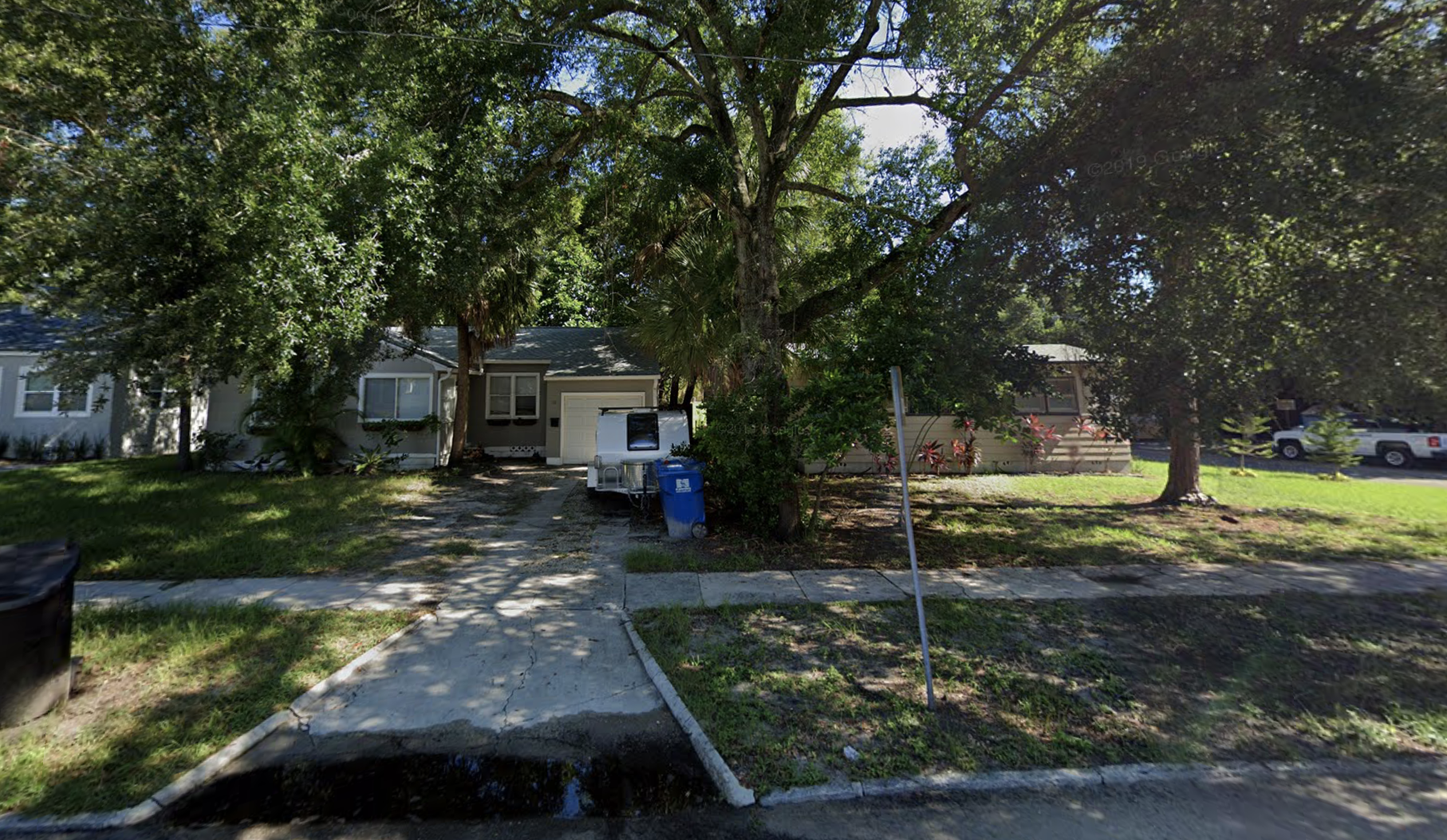 Two single family homes, pictured here, will be razed to make way for the 74-unit development.