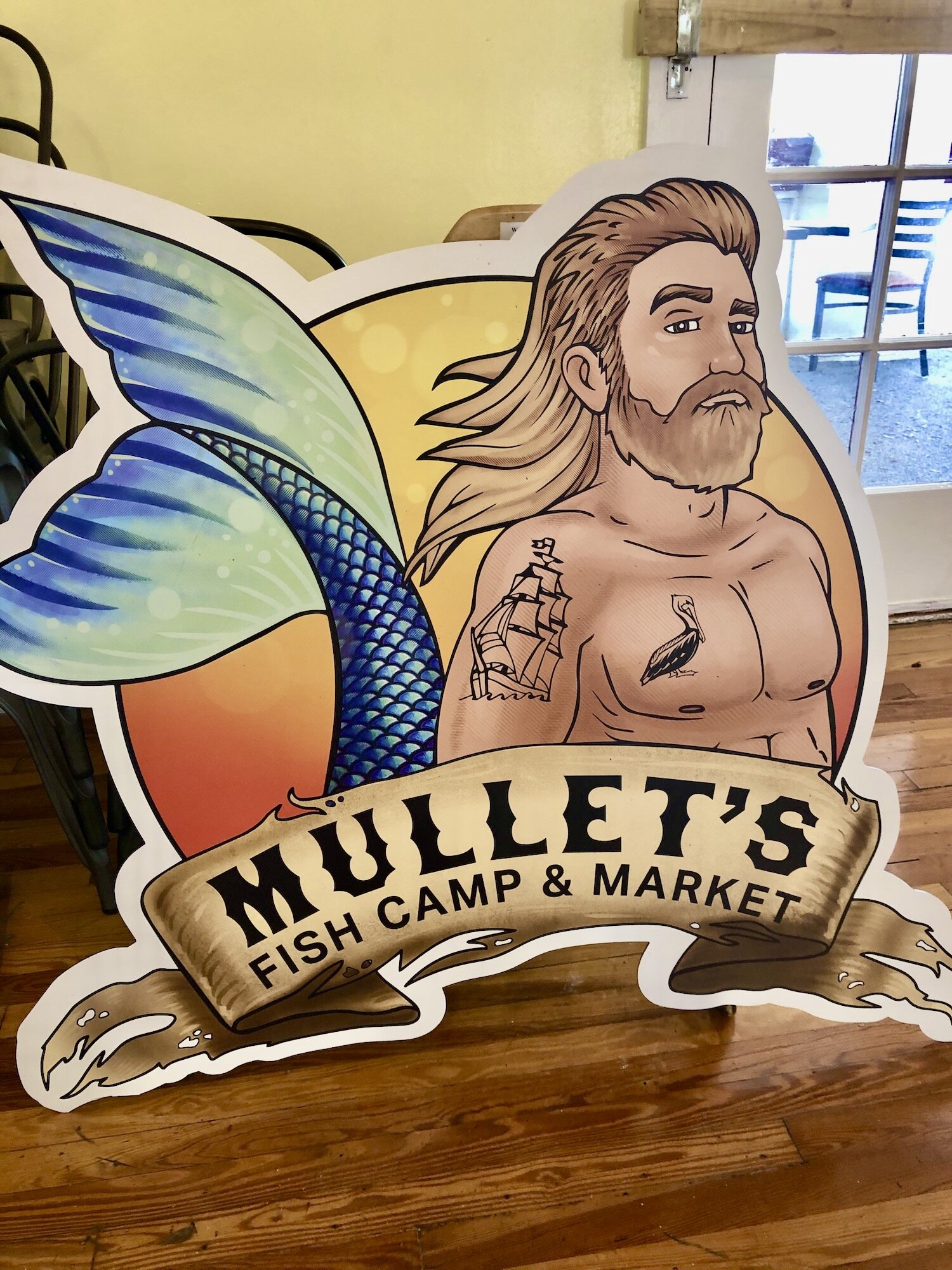 Mullet’s Fish Camp and Market embodies the heart and soul of the mullet hairstyle – business in the front and party in the back